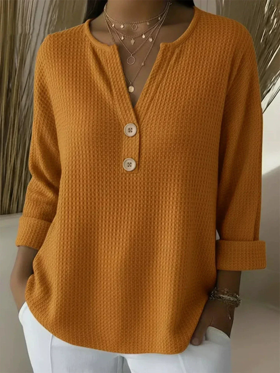 Lucia | T-shirt texturé à col Henley boutonné