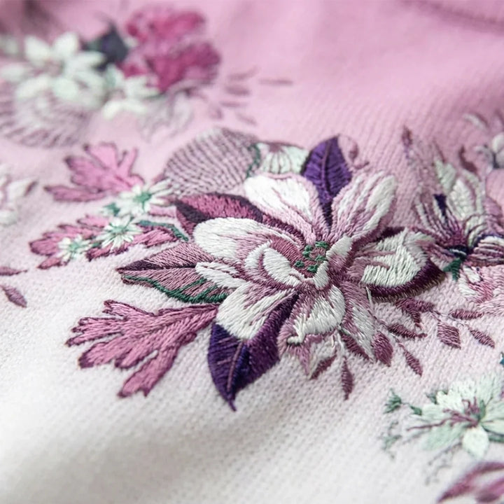 Aurora | Pull floral à col montant