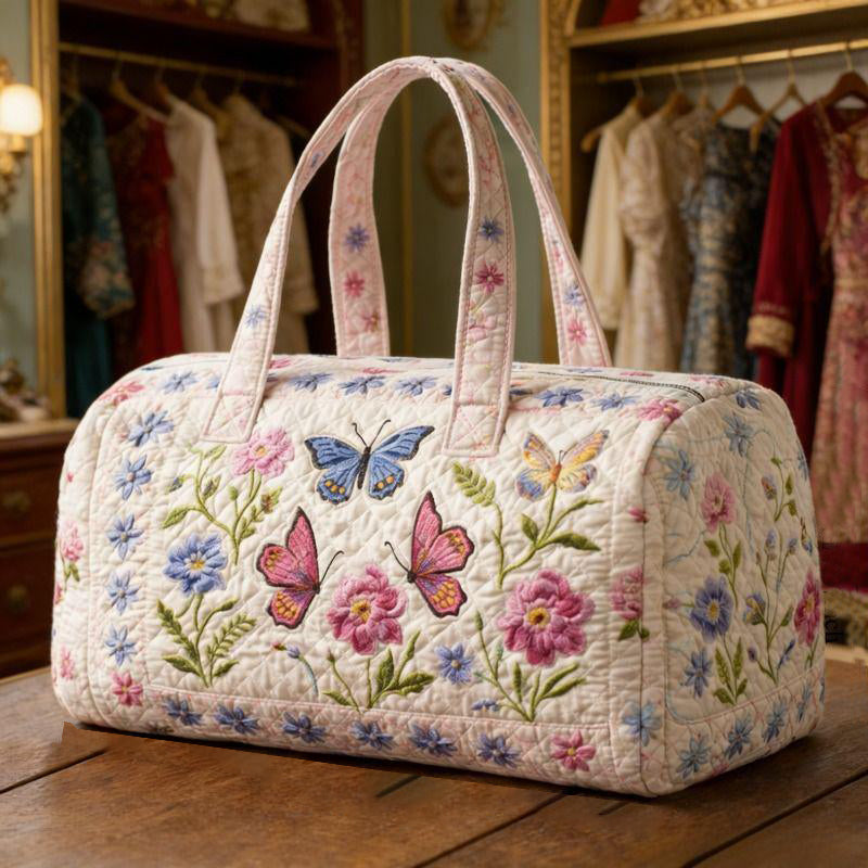 Élodie – sac de voyage matelassé au papillon fleuri