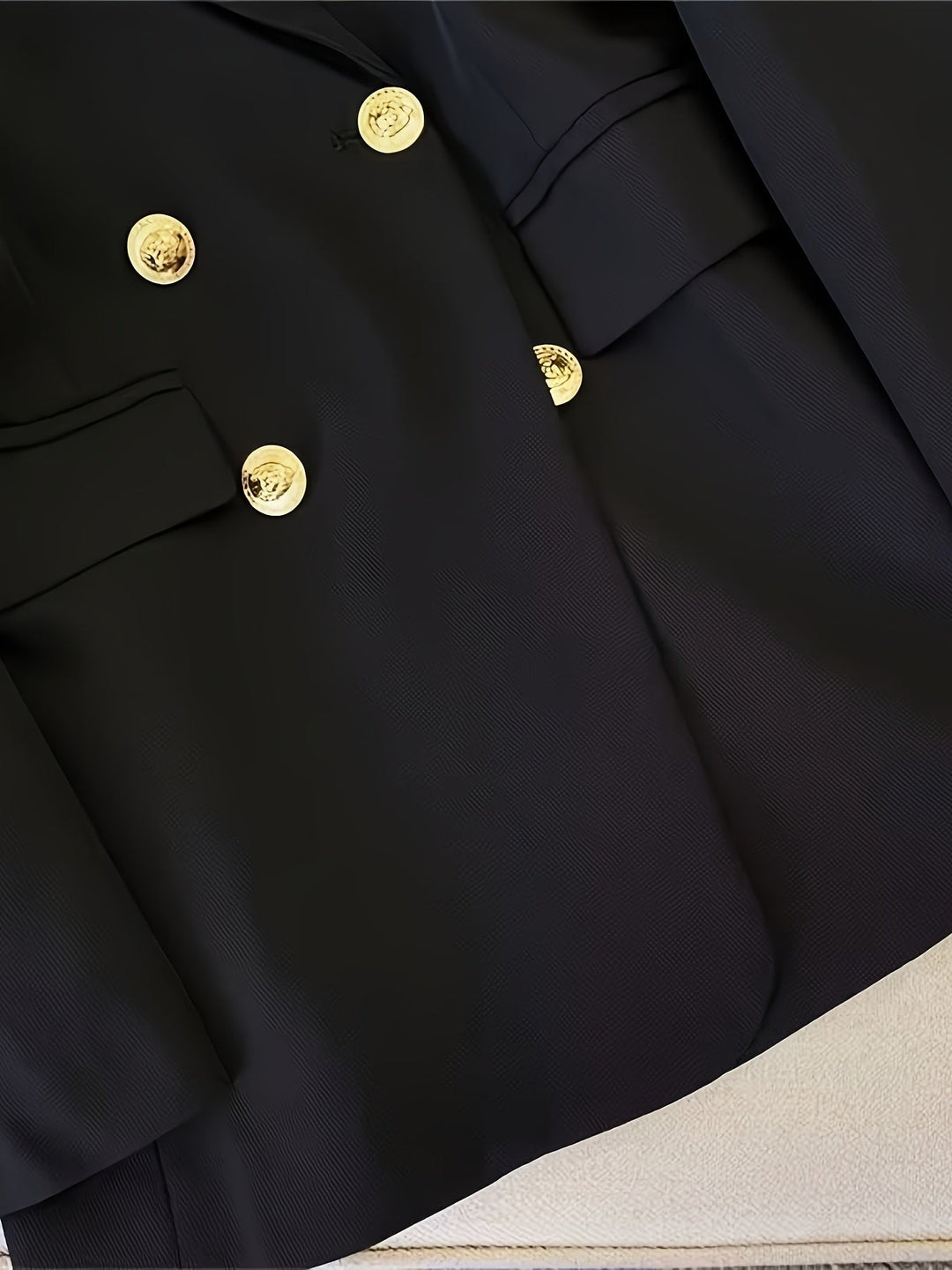 Blazer croisé à boutons dorés