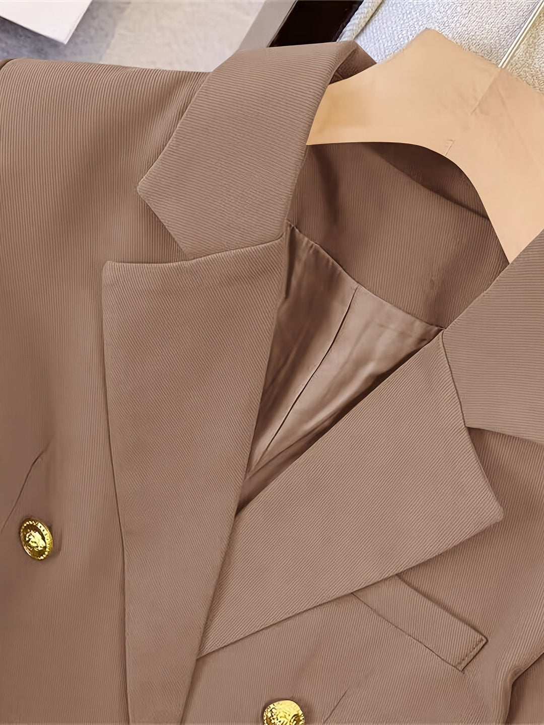 Blazer croisé à boutons dorés